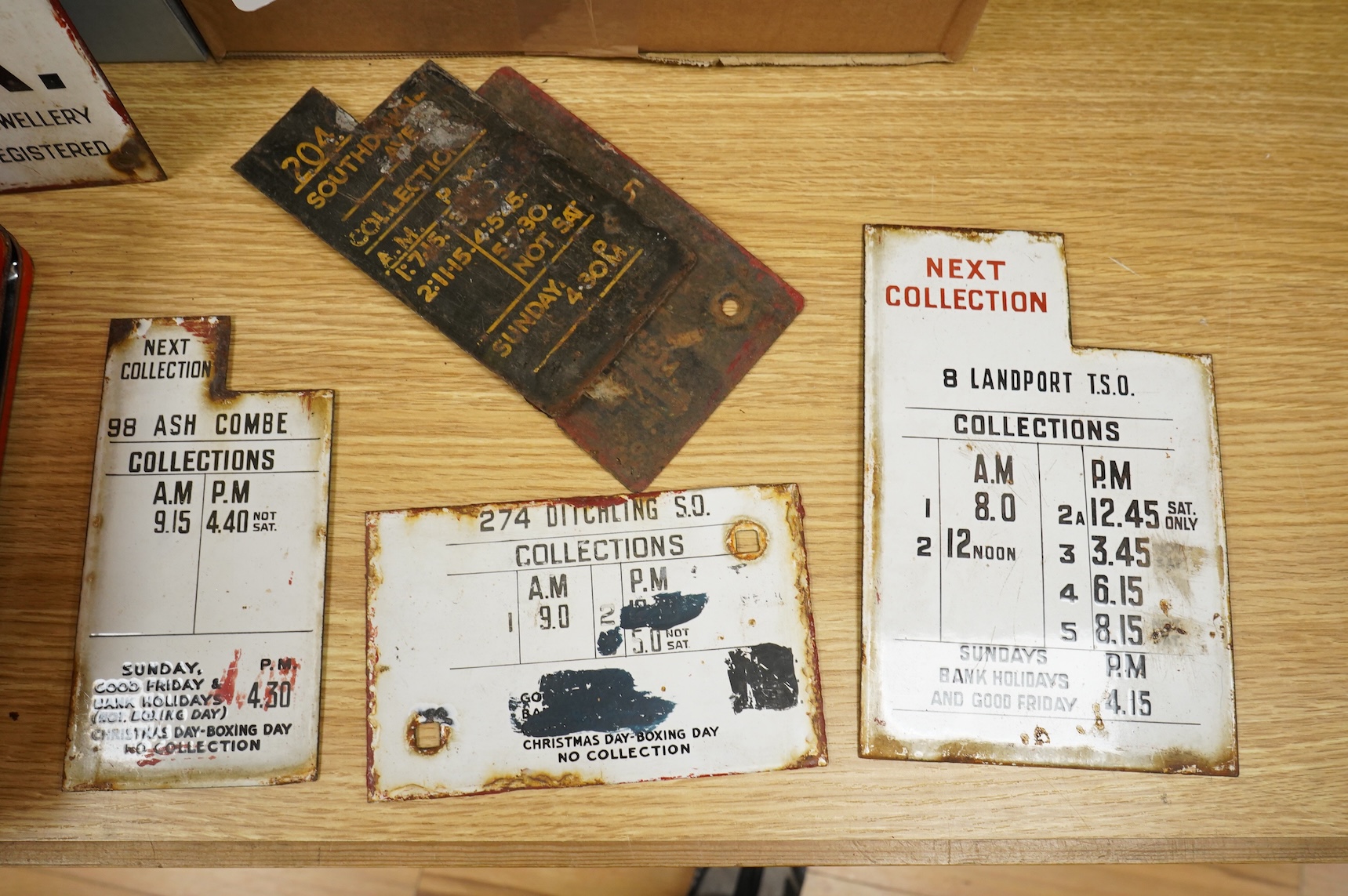 An enamelled GR Post Office Letter Box plaque, together with a group of enamel plates with details regarding the collection of post, the location of the pillar box, blanking plates, etc., with some referring to Lewes loc